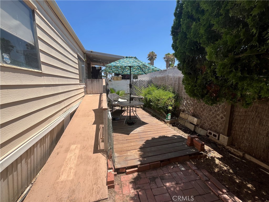 4041 Pedley Road, Unit 93 Riverside, CA 92509 - Photo 25 of 27 a view of a balcony with chairs