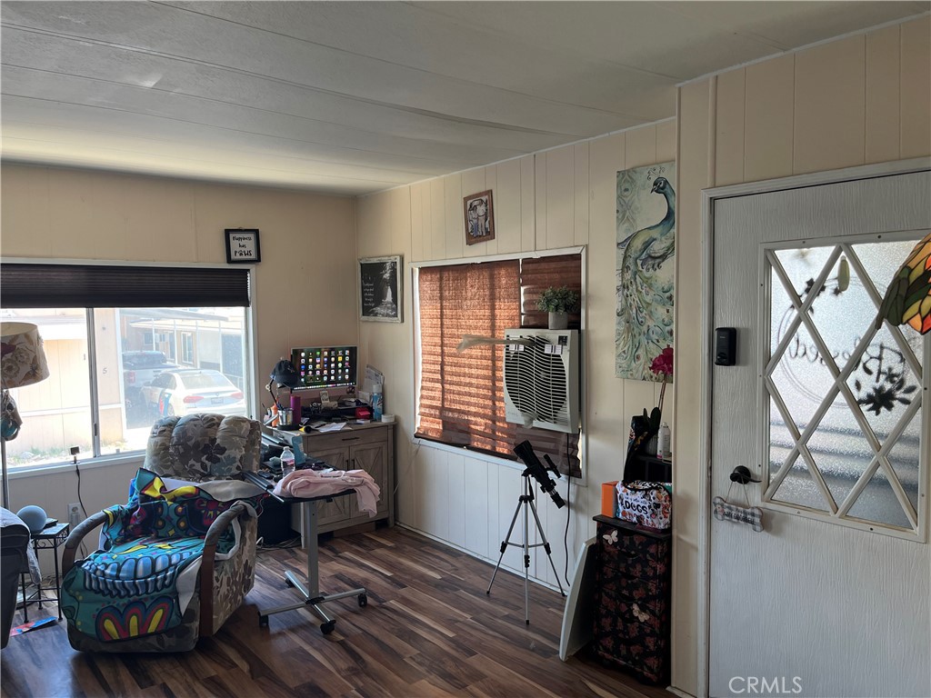 4041 Pedley Road, Unit 93 Riverside, CA 92509 - Photo 5 of 27 a living room with furniture and a window