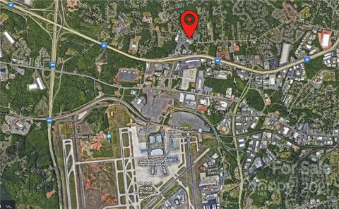 a view of swimming pool with a garden and swimming pool