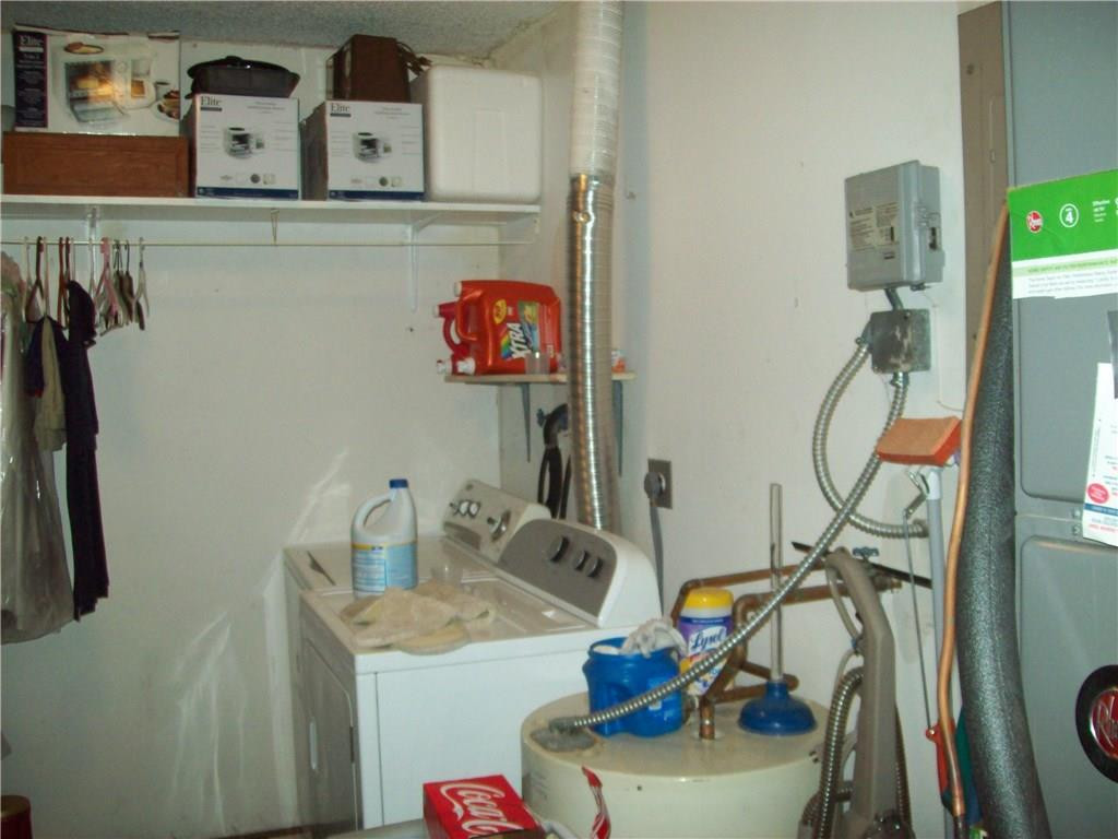 5255 Gate Lake Road, Unit 5255 Tamarac, FL 33319 - Photo 21 of 25 a room with storage and utility