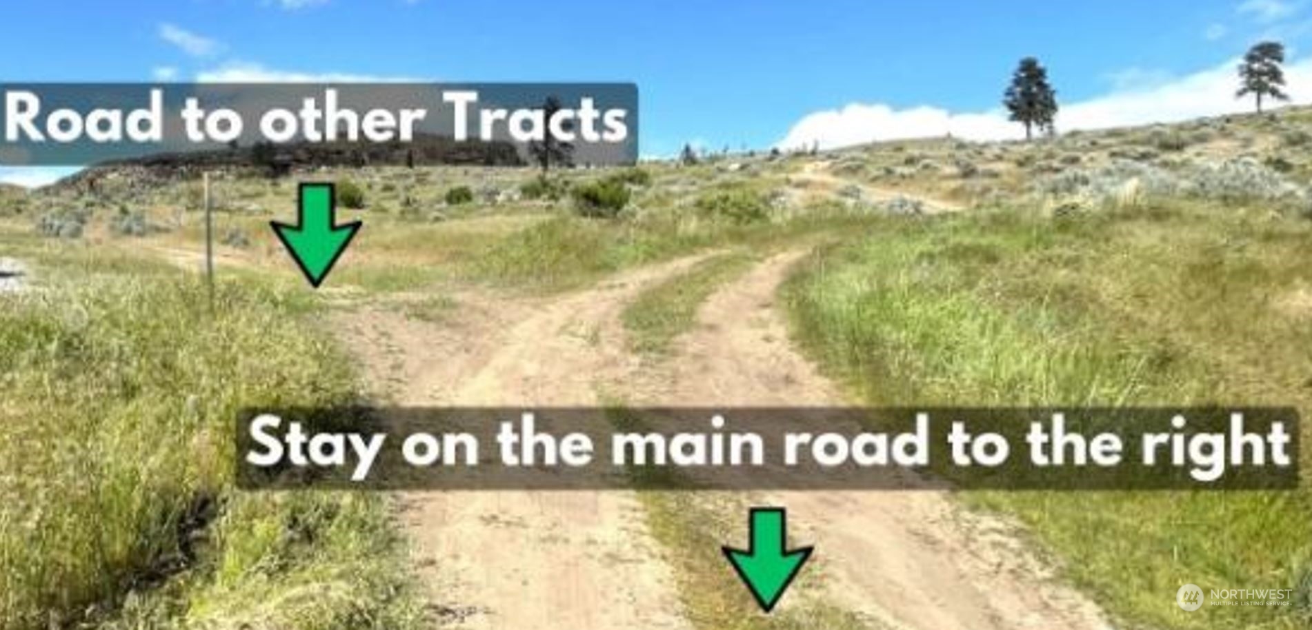 0 McLaughlin Canyon Road, Unit YCC Tonasket, WA 98855 - Photo 9 of 9 a street sign that is sitting on a wooden wall