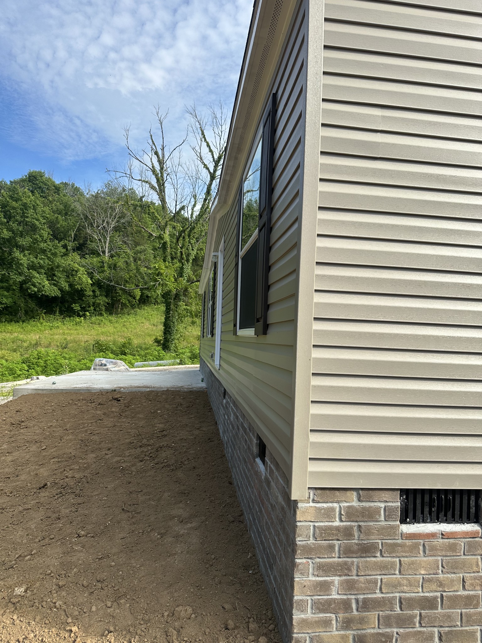 406 Shiloh Church Road Woodbury, TN 37190 - Photo 18 of 18 a view of a house with a yard