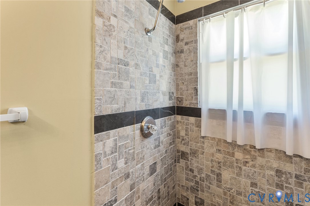 738 Bowlers Road Center Cross, VA 22437 - Photo 17 of 25 Ceramic walk-in shower of Bath.