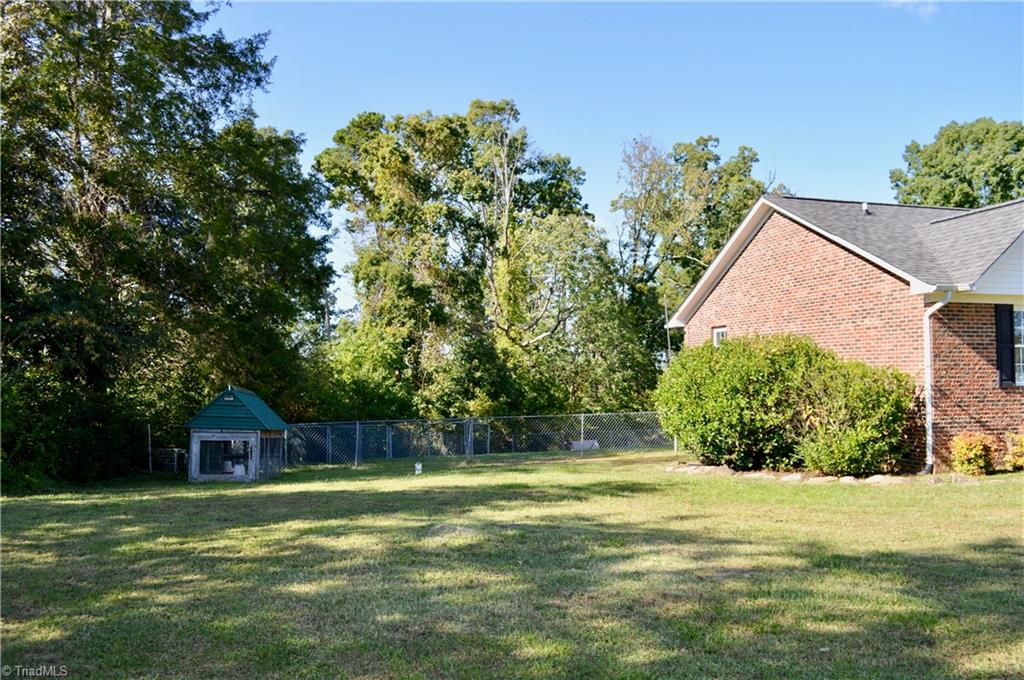 923 Rascoe Dameron Road Burlington, NC 27217 - Photo 3 of 17 Sprawling front, side, and back yard space!