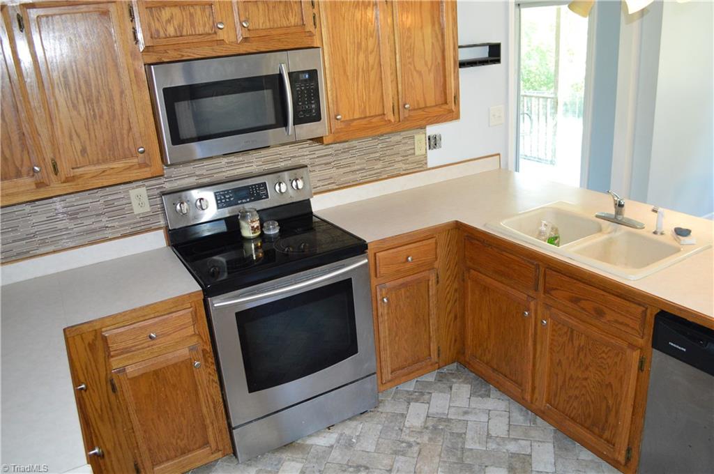 923 Rascoe Dameron Road Burlington, NC 27217 - Photo 8 of 17 Gorgeous new flooring in the kitchen!