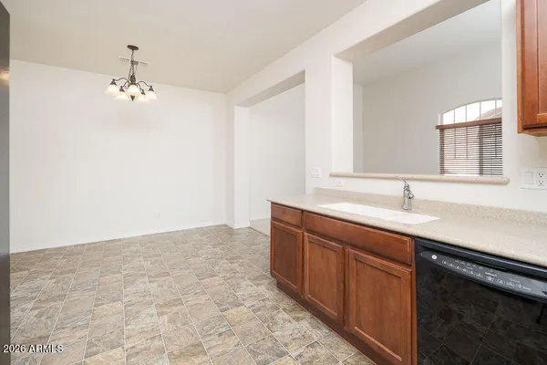 a bathroom with a double vanity sink and mirror