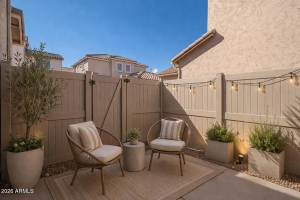 a view of a wrought iron fences in front of house