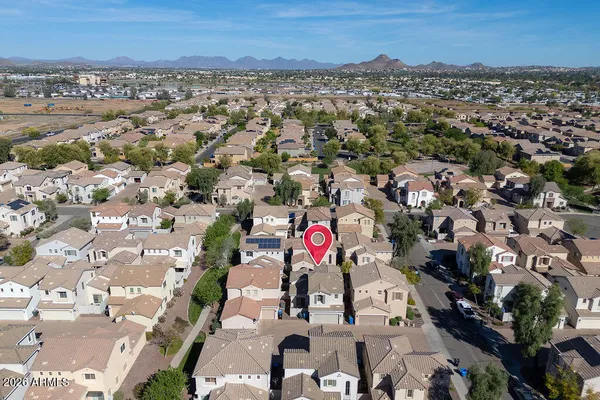 a view of a swimming pool with a yard