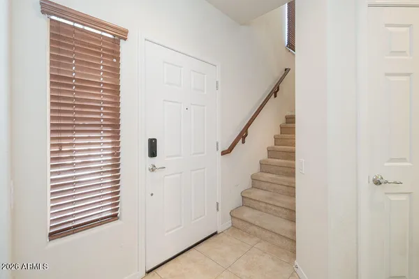 a view of entryway with stairs