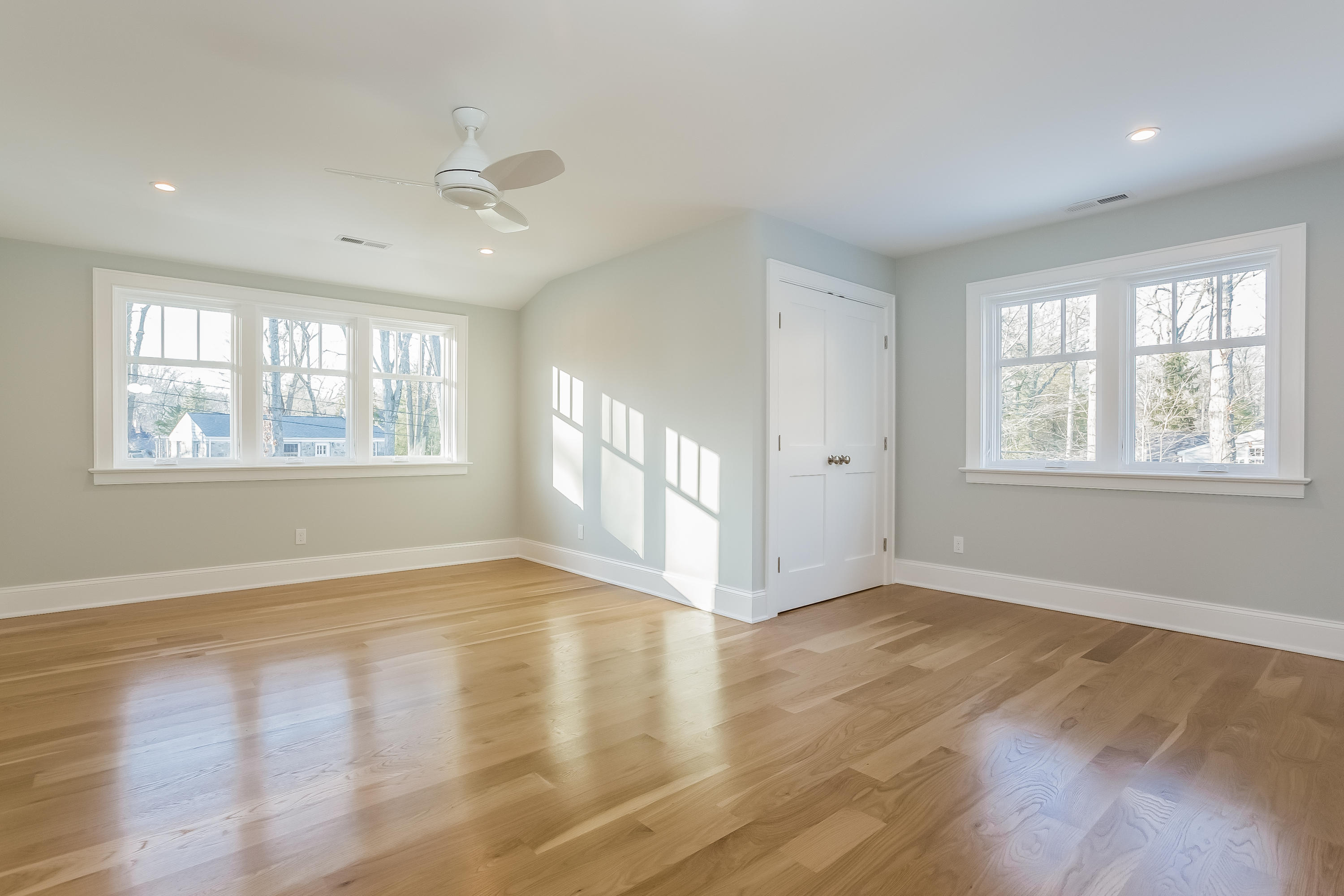 26 Range Road Rowayton, CT 06853 - Photo 17 of 26 a view of an empty room with wooden floor and a window