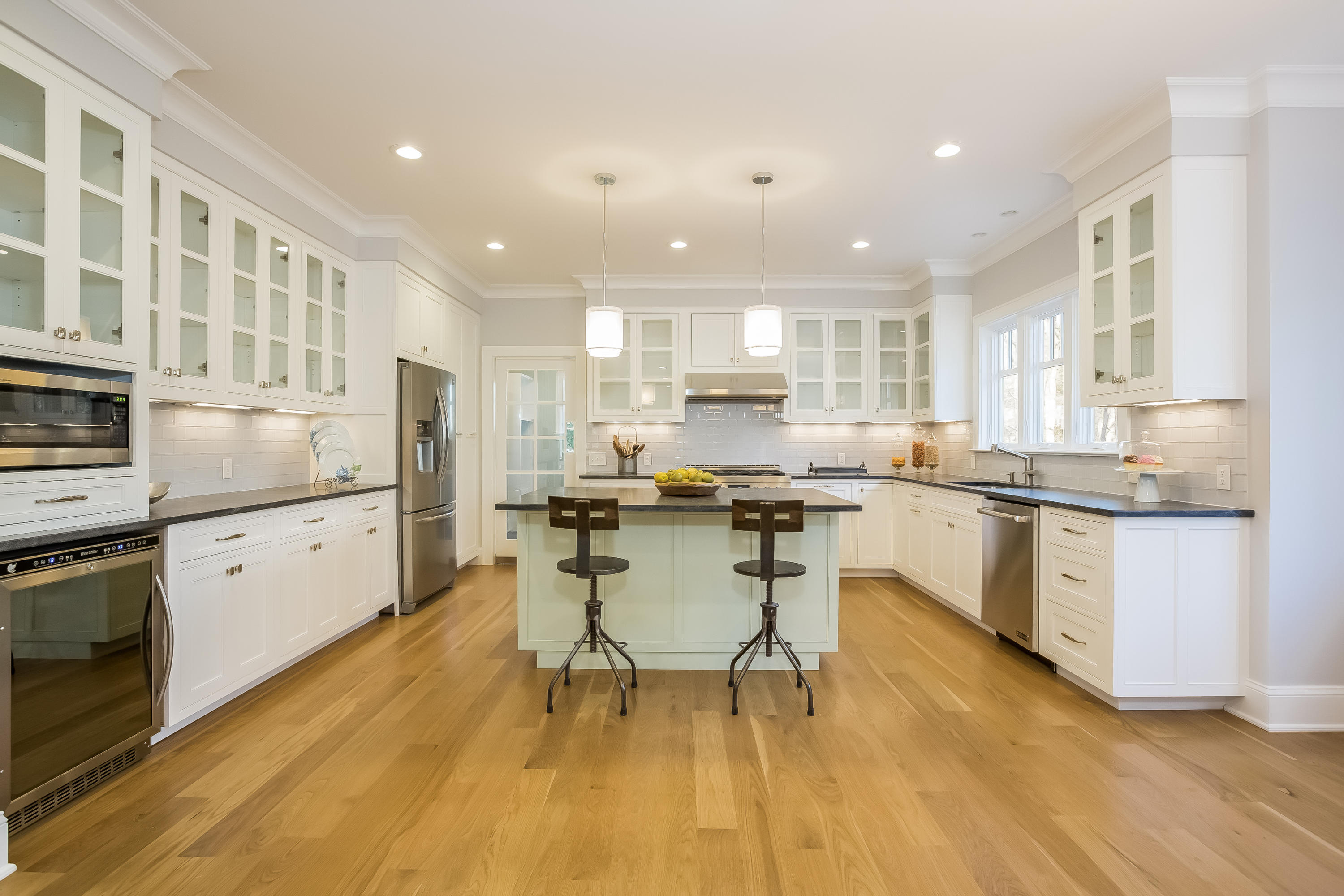 26 Range Road Rowayton, CT 06853 - Photo 8 of 26 a kitchen with a sink a counter top space and stainless steel appliances