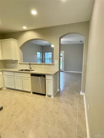 a view of a kitchen with a sink