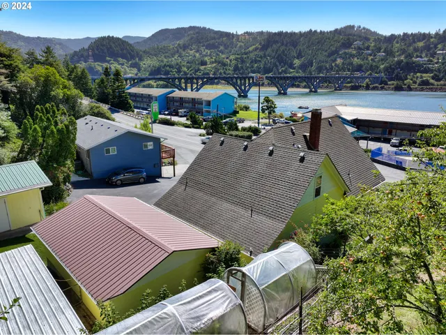an aerial view of a house with a garden