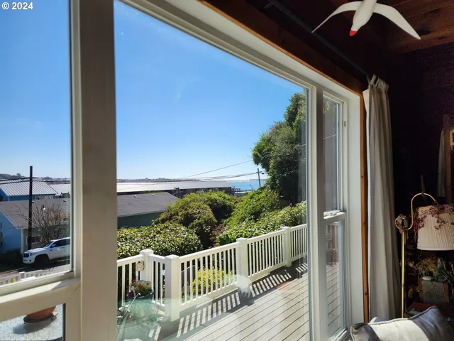 a view of a balcony with chair
