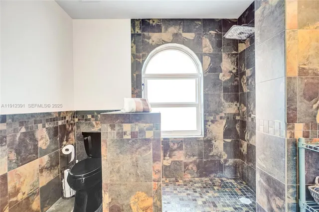 a close view of a bathroom shower