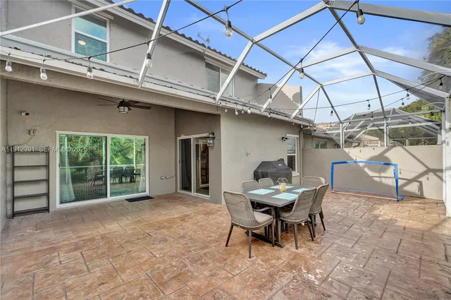 a view of an outdoor space with furniture