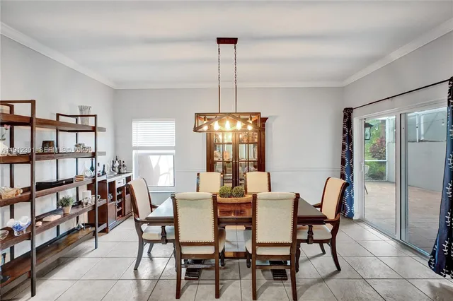 a bedroom with a bed and a lamp on table