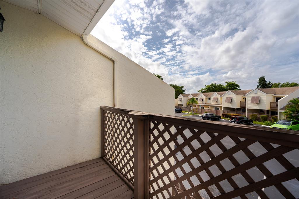 272 West Hemingway Circle Margate, FL 33063 - Photo 19 of 61 a view of a street with wooden fence