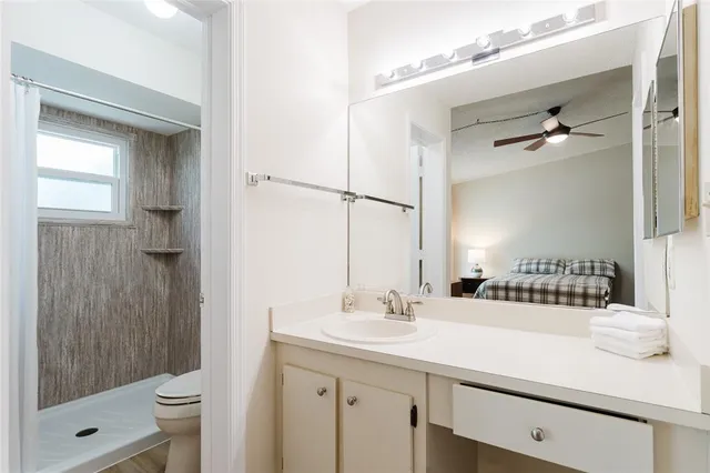 a view of a balcony with wooden floor
