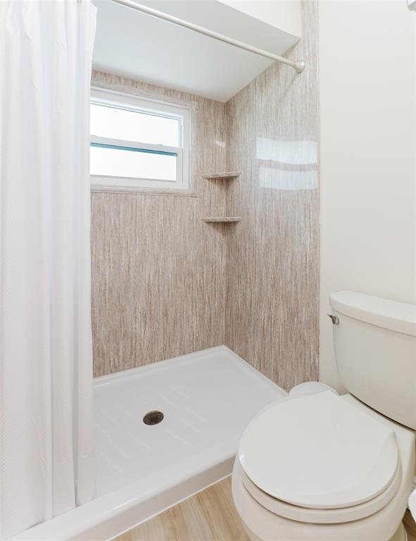 272 West Hemingway Circle Margate, FL 33063 - Photo 28 of 61 a bathroom with a toilet and a shower