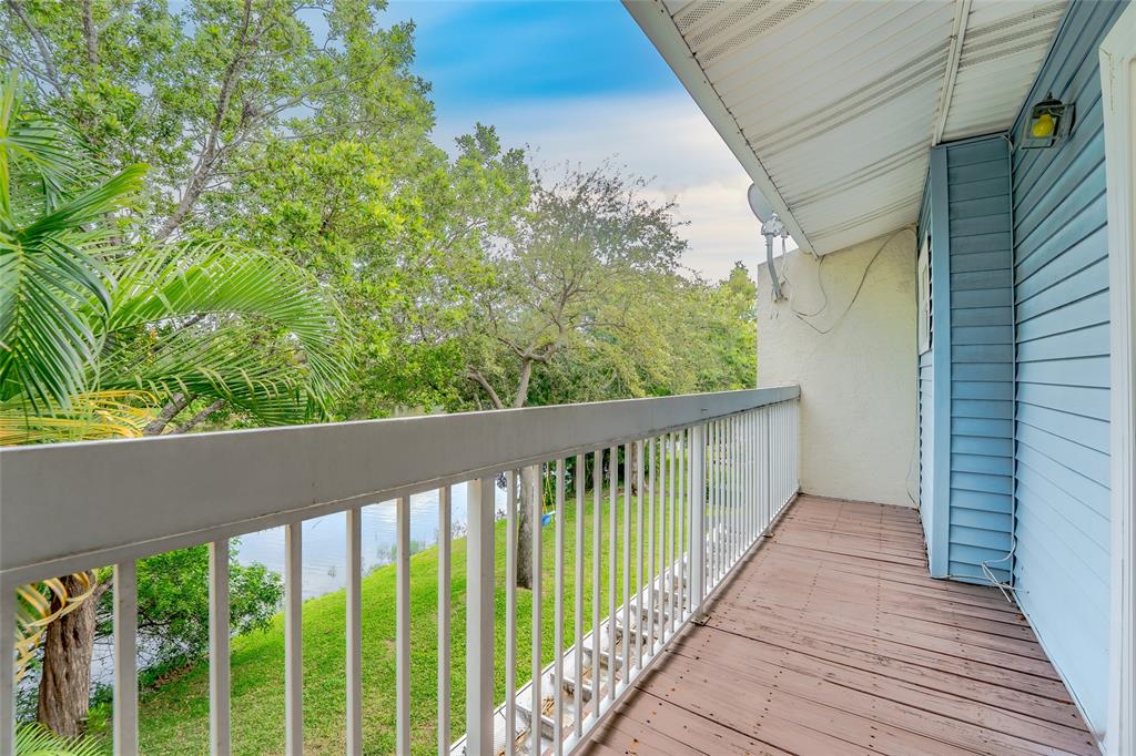 272 West Hemingway Circle Margate, FL 33063 - Photo 30 of 61 a view of a balcony with wooden floor
