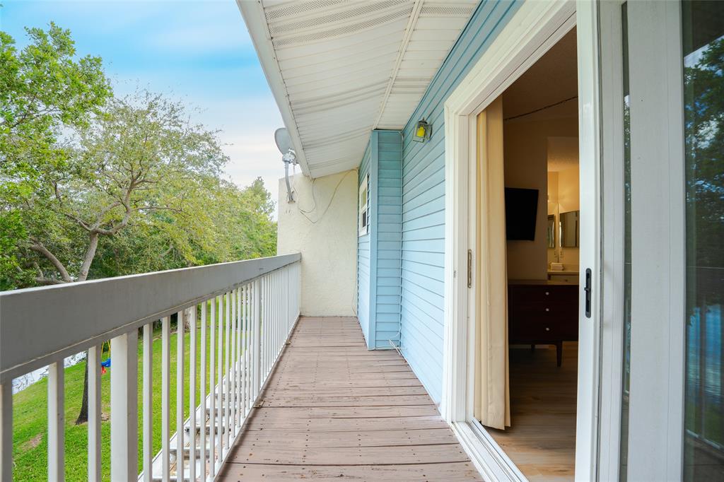 272 West Hemingway Circle Margate, FL 33063 - Photo 31 of 61 a view of a balcony with wooden floor