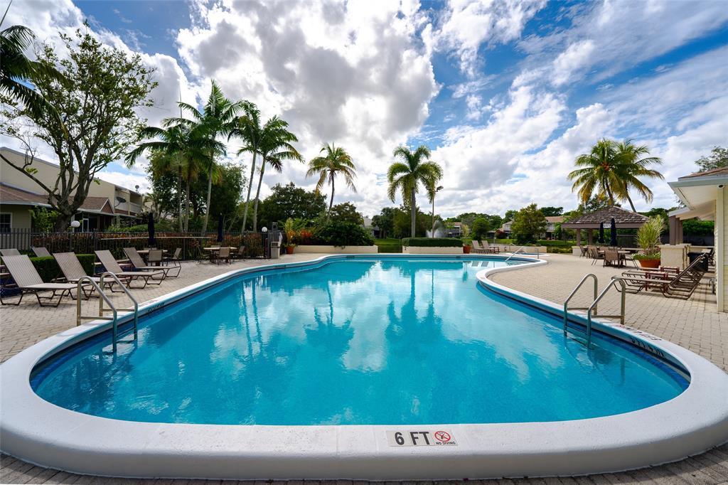 272 West Hemingway Circle Margate, FL 33063 - Photo 44 of 61 a view of swimming pool with chairs