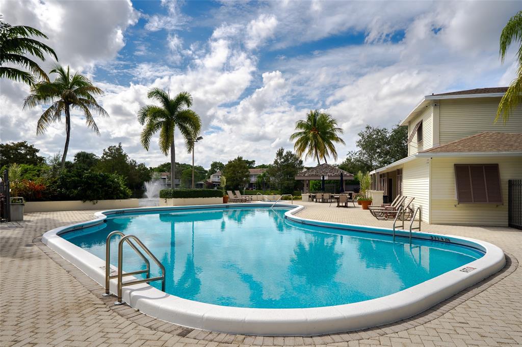 272 West Hemingway Circle Margate, FL 33063 - Photo 45 of 61 a view of a swimming pool with a patio
