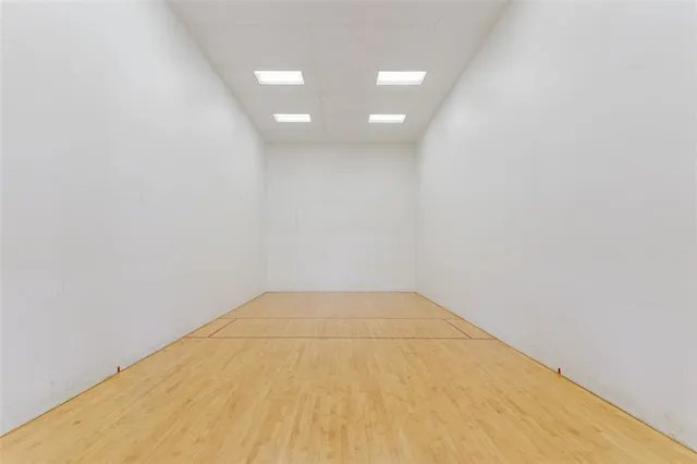 a view of a swimming pool with a outdoor seating and a swimming pool