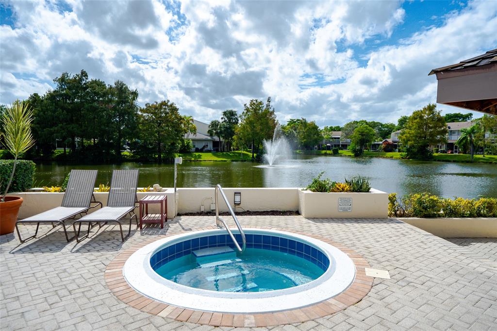 272 West Hemingway Circle Margate, FL 33063 - Photo 50 of 61 a view of swimming pool with outdoor seating and plants