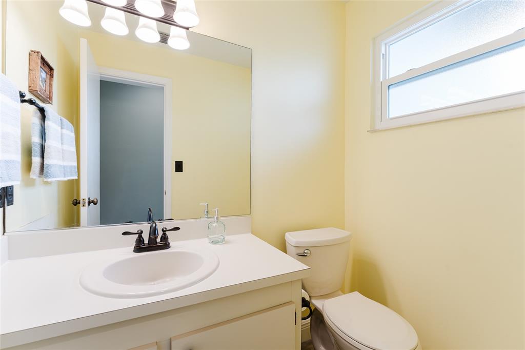 272 West Hemingway Circle Margate, FL 33063 - Photo 9 of 61 a bathroom with a sink a toilet and mirror