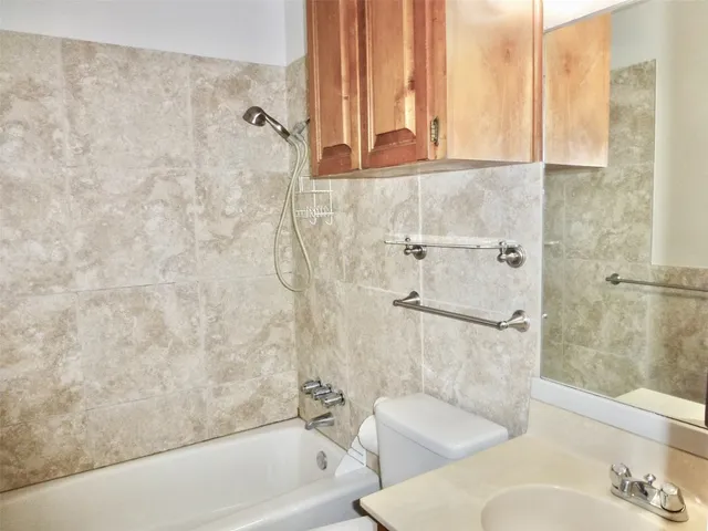 a bathroom with a sink and a bathtub