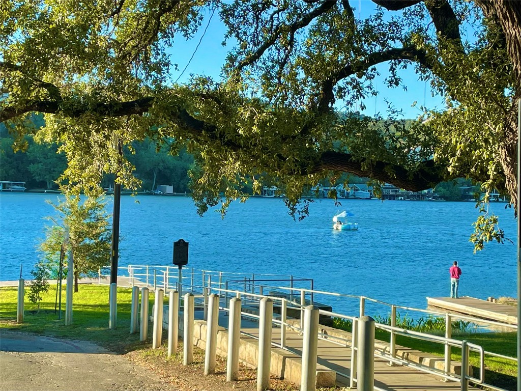 601 Hearn Street, Unit 207 Austin, TX 78703 - Photo 2 of 40 a front view of a house with a yard