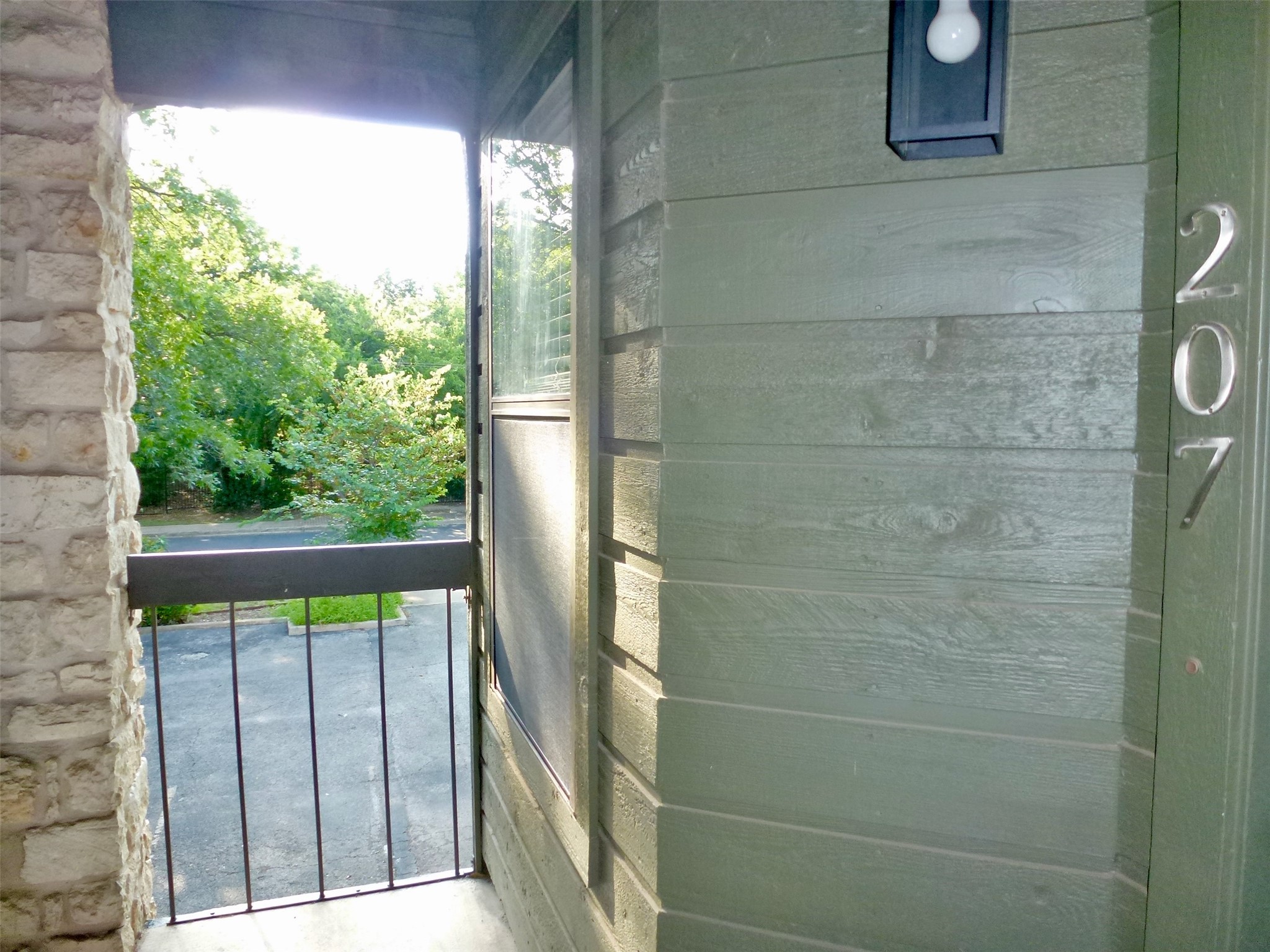 601 Hearn Street, Unit 207 Austin, TX 78703 - Photo 22 of 40 a view of a balcony