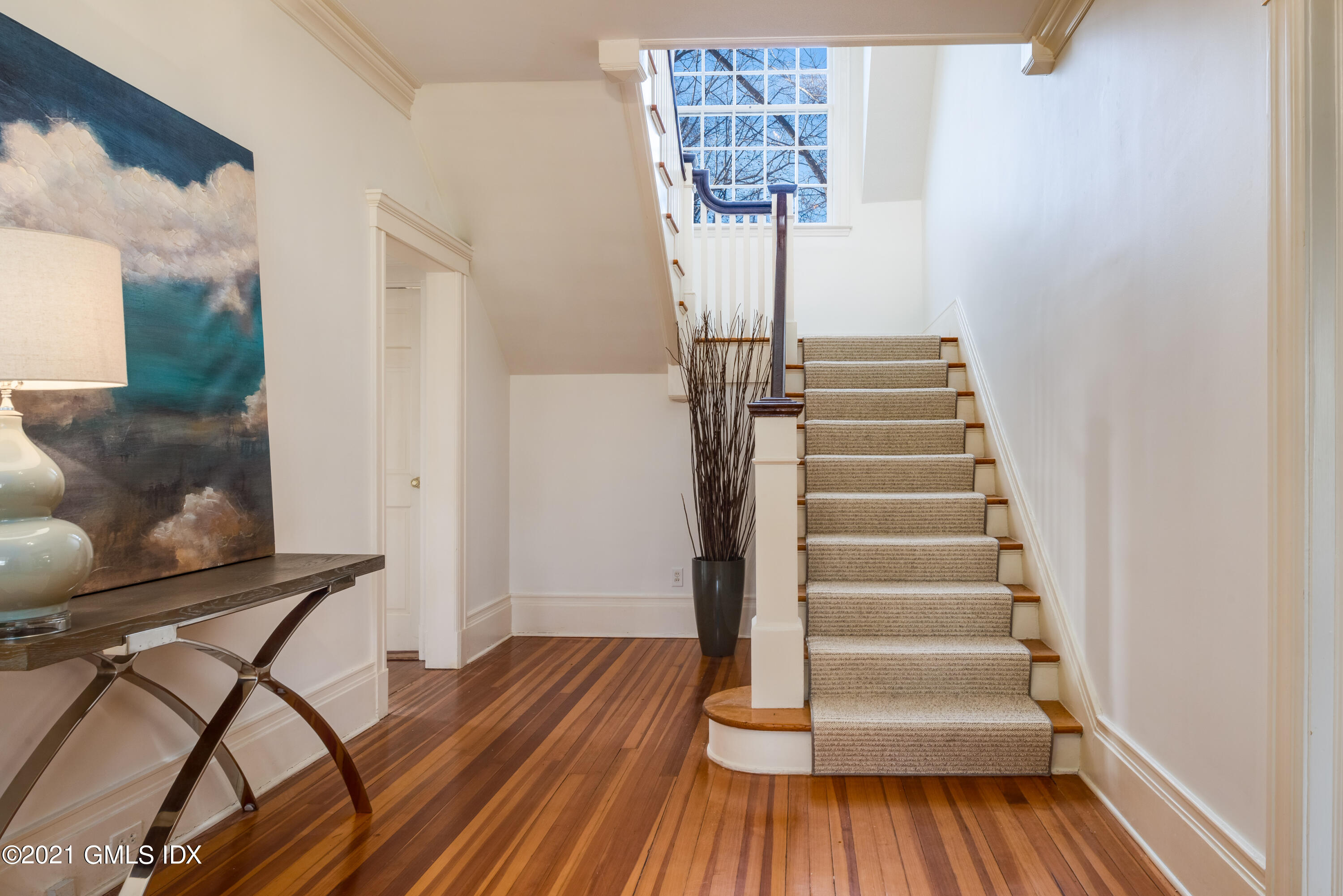 8 Hillside Drive Greenwich, CT 06831 - Photo 9 of 30 a view of entryway and hall with wooden floor