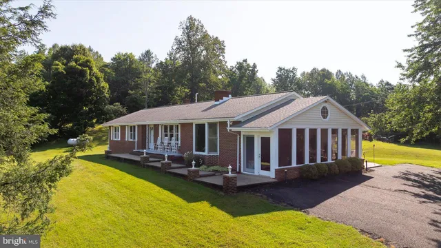 a view of a house with a big yard