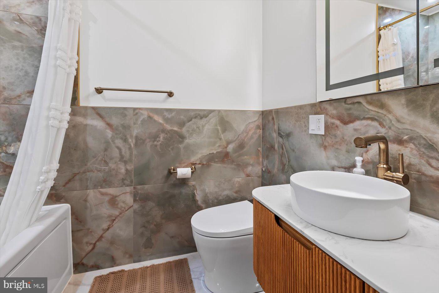 436 Castleton View Road Castleton, VA 22716 - Photo 25 of 66 a bathroom with a sink a toilet and a mirror