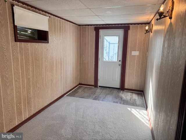 a view of a swimming pool with seating area