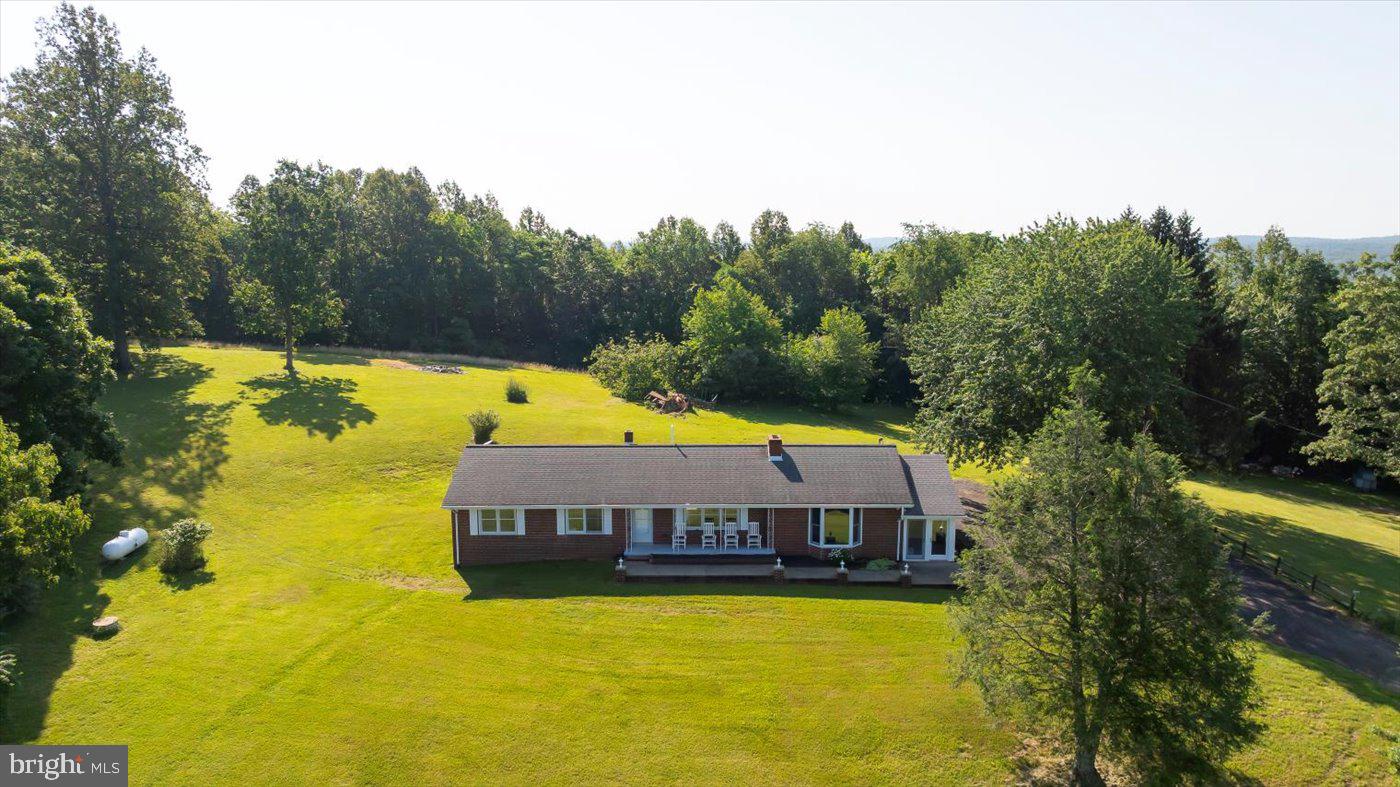 436 Castleton View Road Castleton, VA 22716 - Photo 50 of 66 a view of a swimming pool with seating area