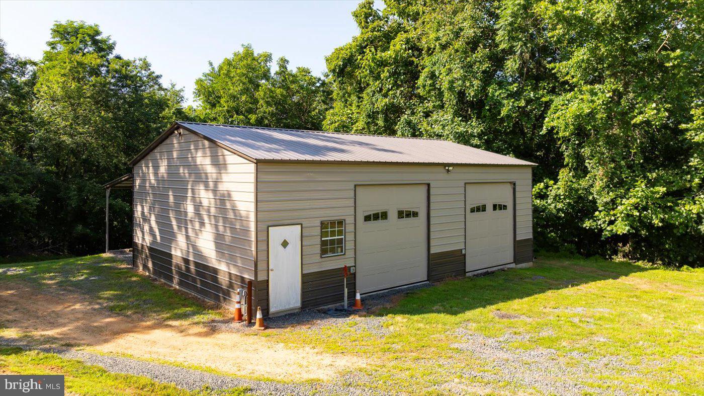 436 Castleton View Road Castleton, VA 22716 - Photo 55 of 66 a view of a house with a yard