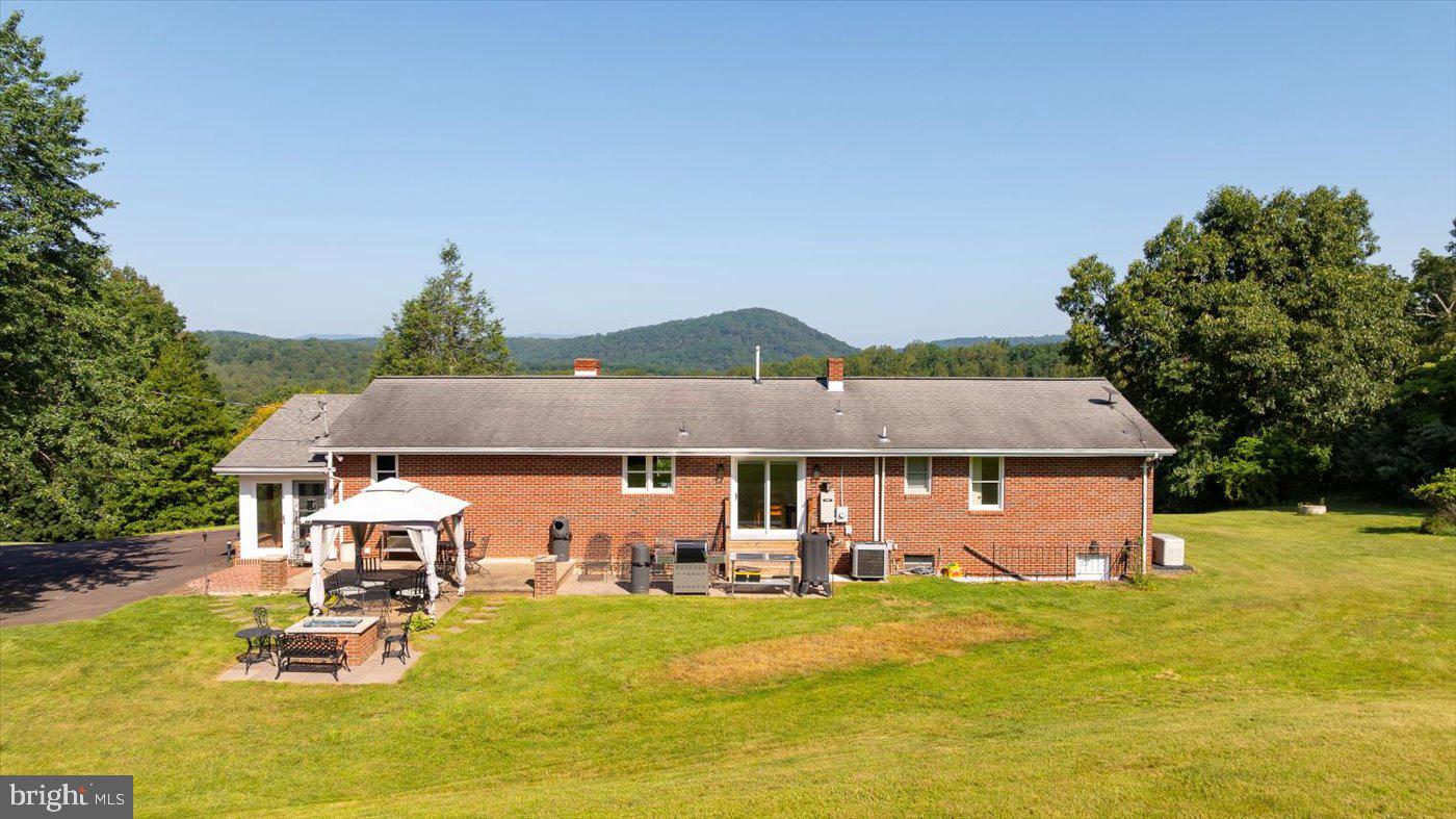 436 Castleton View Road Castleton, VA 22716 - Photo 65 of 66 an aerial view of a house with swimming pool garden and patio