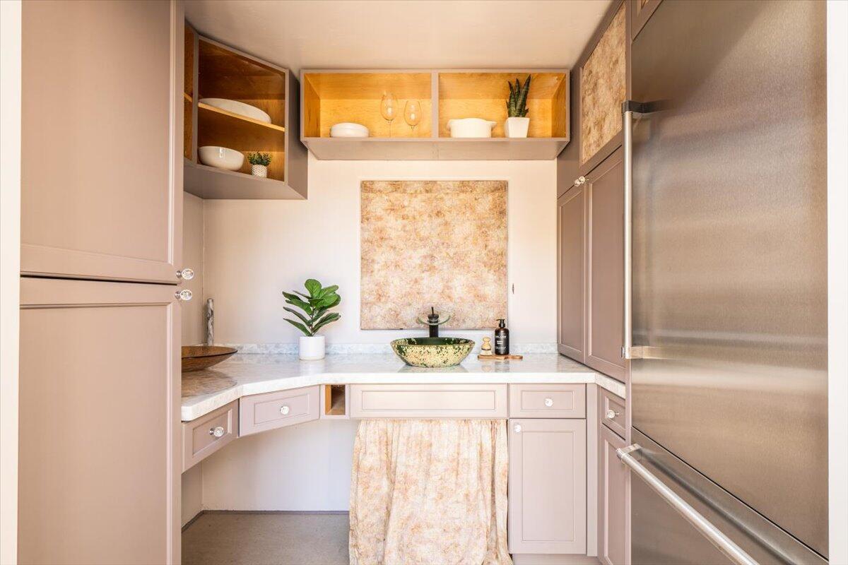 1910 Tularosa Road Lompoc, CA 93436 - Photo 34 of 55 a kitchen with a refrigerator a sink and a window