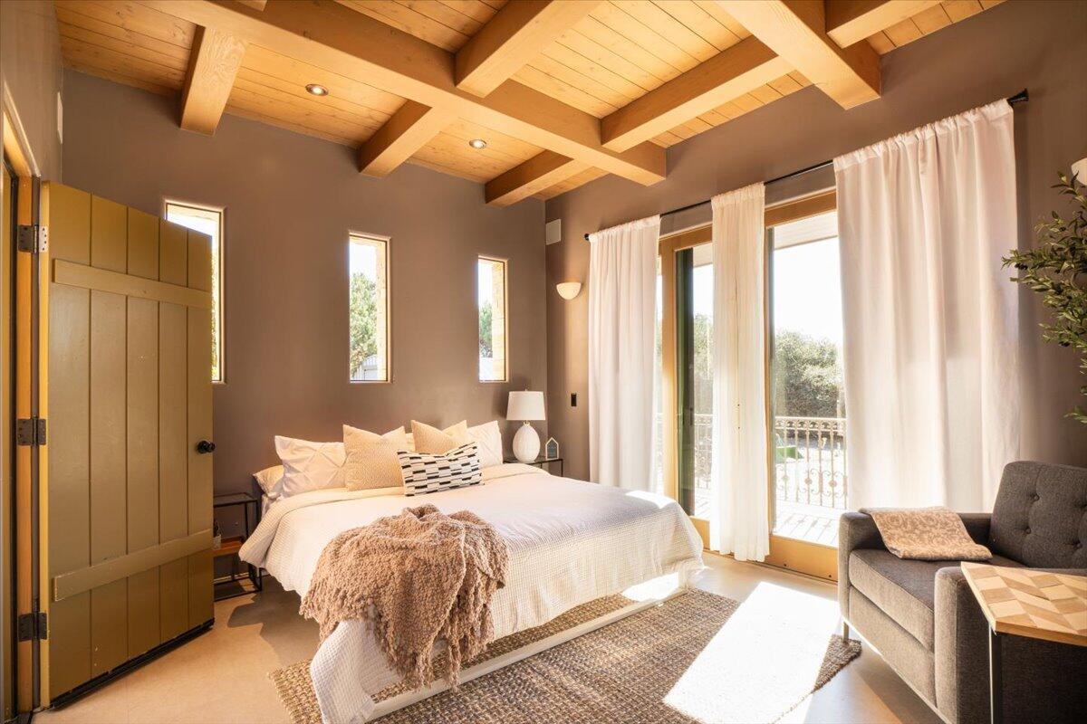 1910 Tularosa Road Lompoc, CA 93436 - Photo 35 of 55 a bedroom with a bed and wooden floor