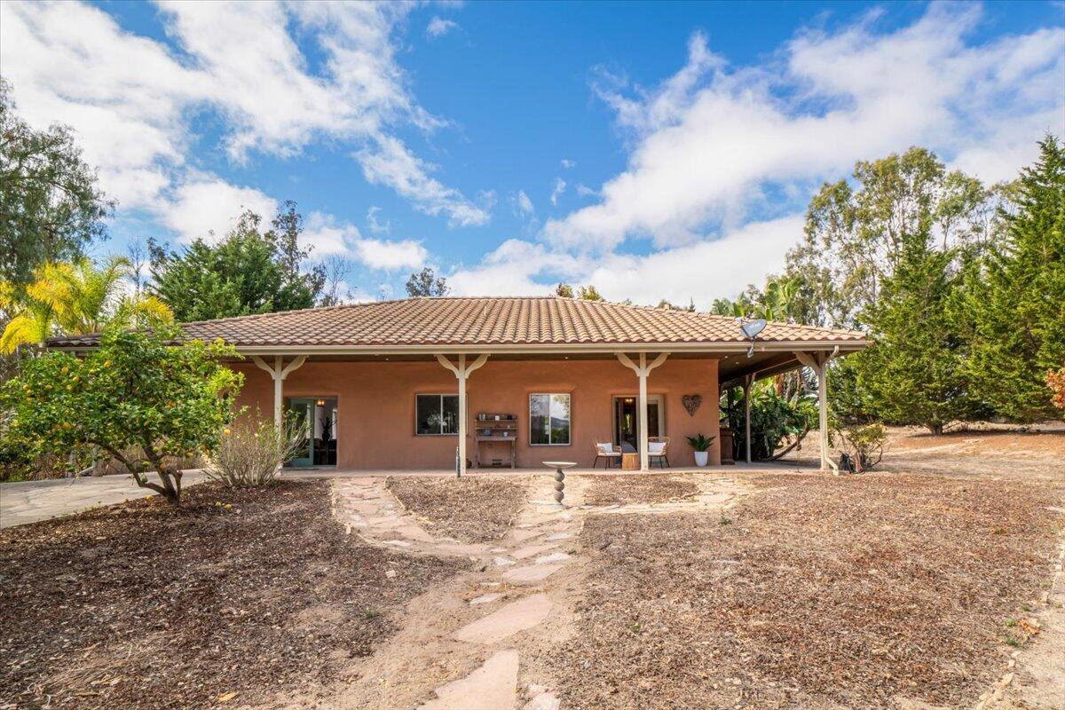 1910 Tularosa Road Lompoc, CA 93436 - Photo 50 of 55 a front view of a house with a yard