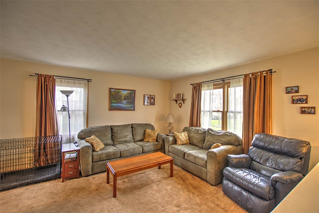 4081 Sheffield Court Decatur, IL 62526 - Photo 7 of 29 a living room with furniture and a window
