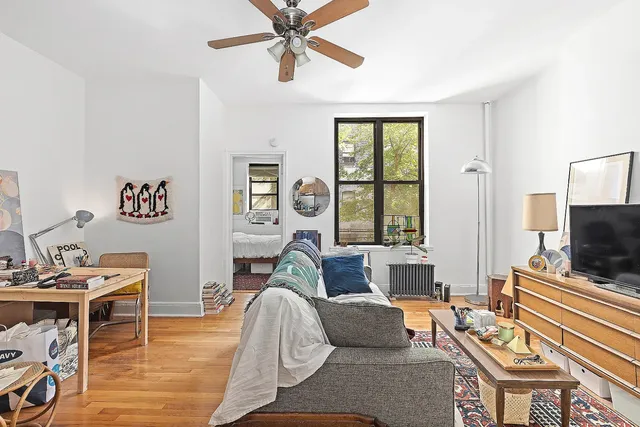 a view of a street with cars