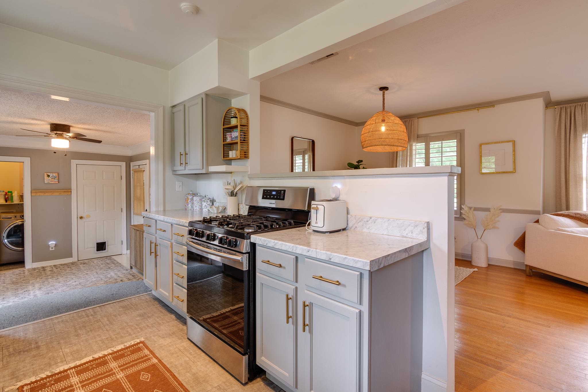 4952 Mockingbird Lane Memphis, TN 38117 - Photo 15 of 28 a kitchen with a stove and a refrigerator
