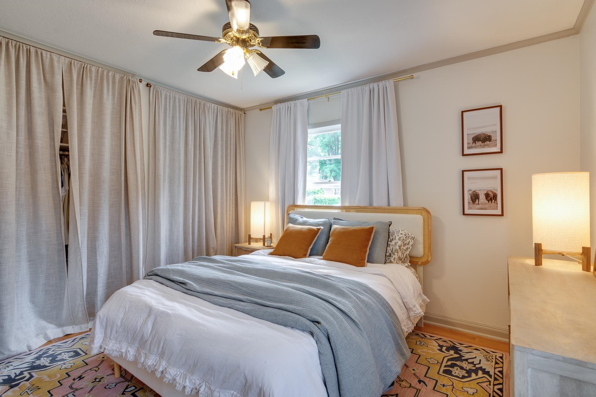 4952 Mockingbird Lane Memphis, TN 38117 - Photo 19 of 28 a bedroom with a bed and a chandelier