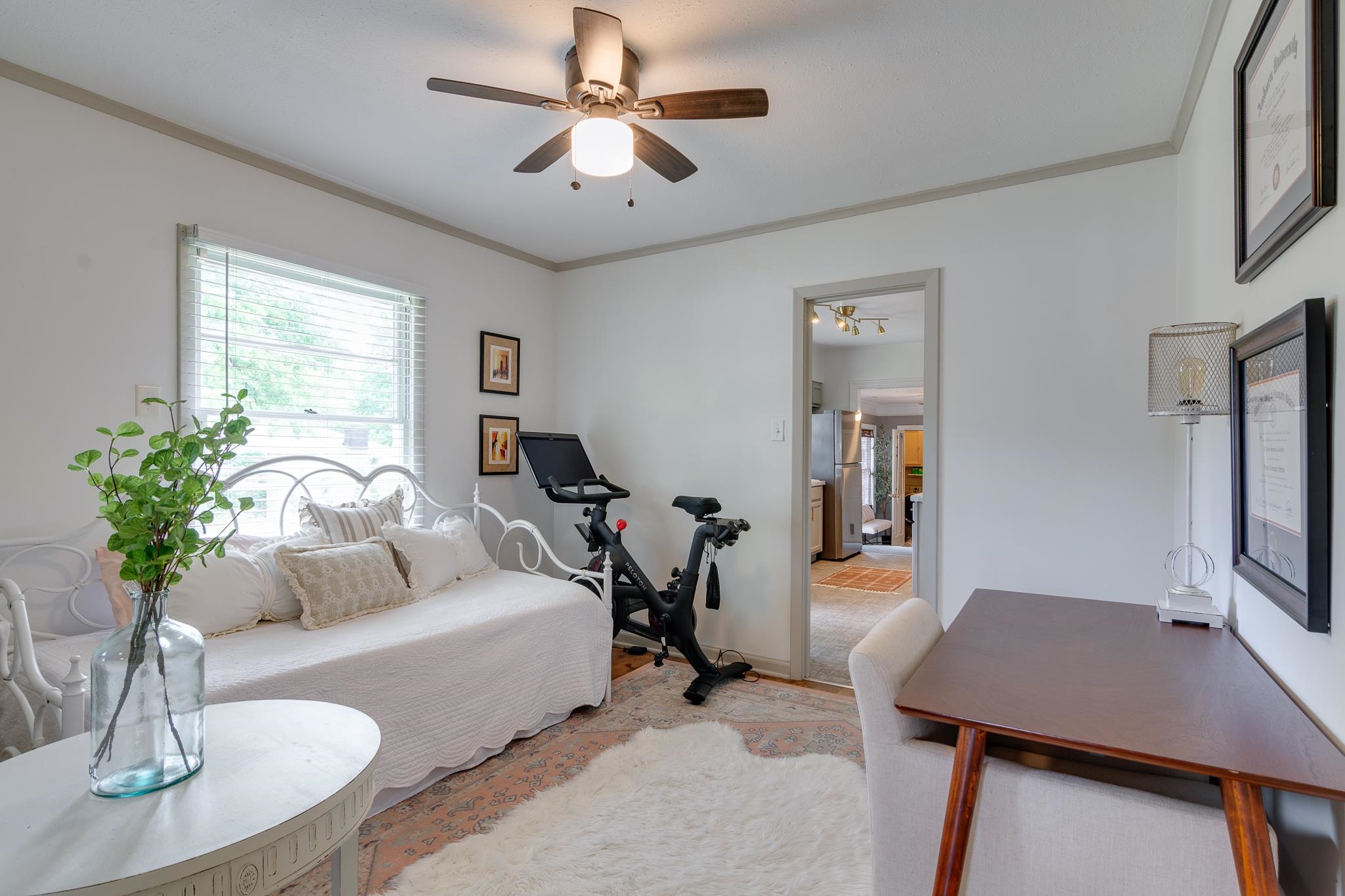 4952 Mockingbird Lane Memphis, TN 38117 - Photo 23 of 28 a living room with furniture a chandelier and a dining room