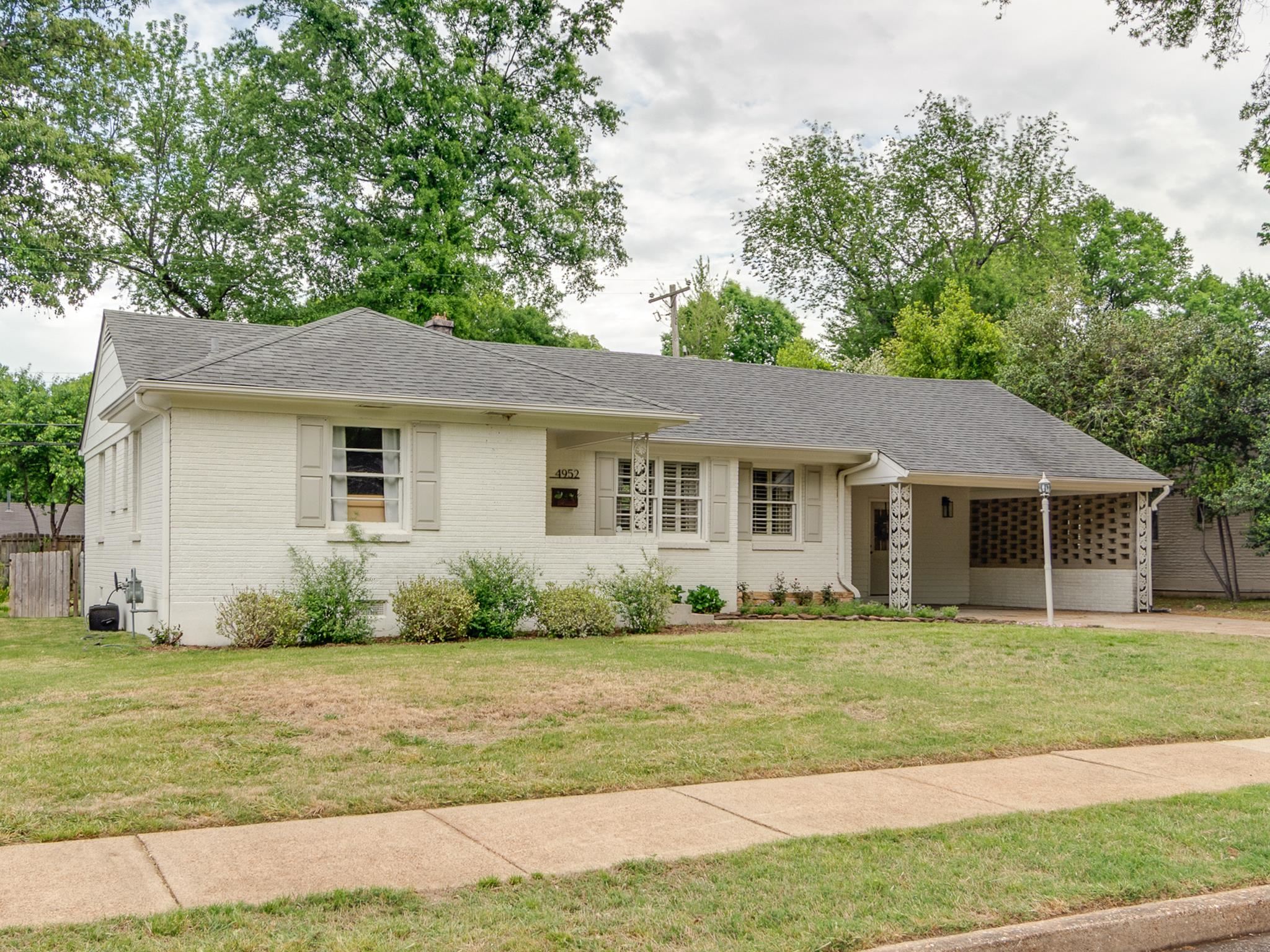 4952 Mockingbird Lane Memphis, TN 38117 - Photo 28 of 28 a view of a house with a yard